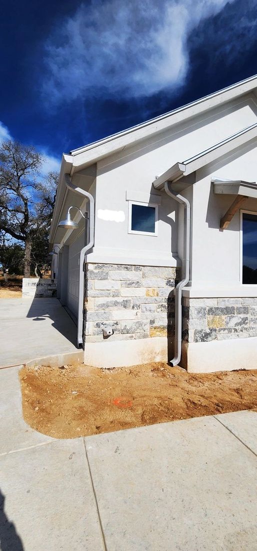 Seamless gutter installation by Guthrie Gutters (project photo 11)